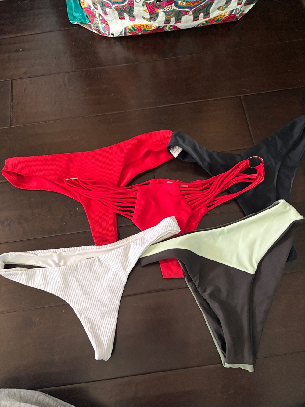 Five Women’s Swim Bottoms— high end, never worn
